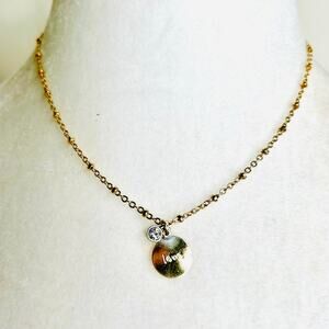 2028 Gold Tone Disc Engraved Love Pendant Necklace